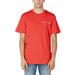 Person wearing red Tommy Hilfiger Jeans Men T-Shirt