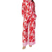 Red and white patterned Vila Clothes jumpsuit with wide-leg pants and long sleeves