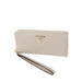 Guess women’s beige Sa Sa wallet showcasing urban city style fashion