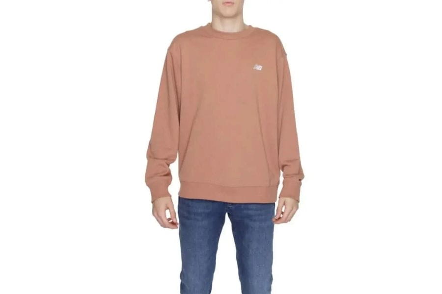 Salmon-colored crewneck sweatshirt featuring a small logo on the chest for men’s fashion.