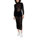 Calvin Klein Jeans sheer black long-sleeved bodycon dress with side slit, shorts, white sneakers