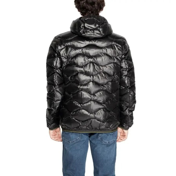 Shiny black quilted puffer jacket worn with blue jeans by Blauer Men Jacket