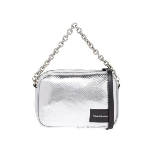 Silver metallic Calvin Klein handbag with chain strap and branding for women