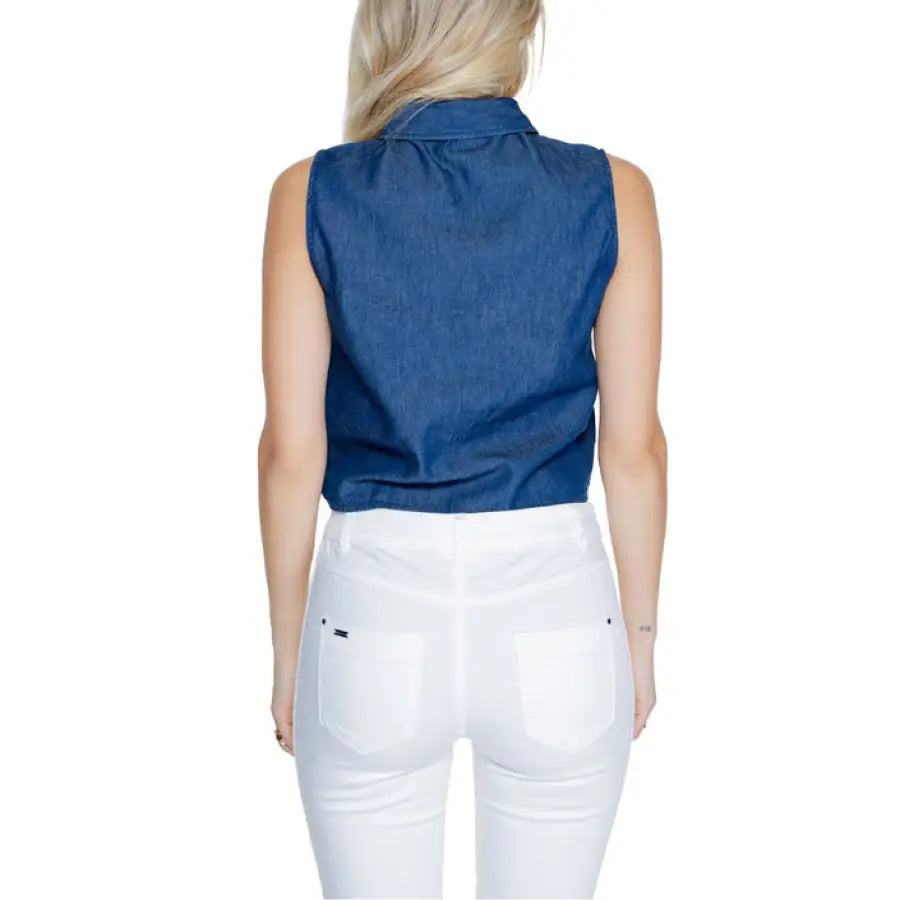 Sleeveless blue denim shirt with white pants, back view - Jacqueline De Yong Women’s Shirt