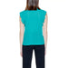 Sleeveless turquoise blouse with ruffled shoulders viewed from the back by Rinascimento