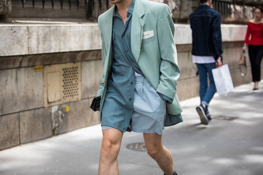 Stylish mint green blazer paired with teal romper for men summer smart casual look.