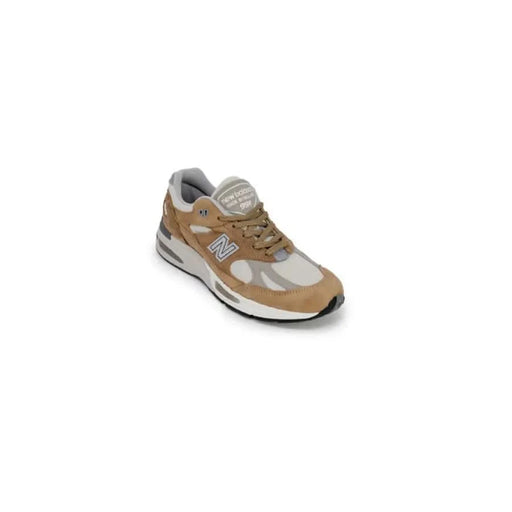 Tan and gray New Balance men sneakers featuring a stylish chunky sole