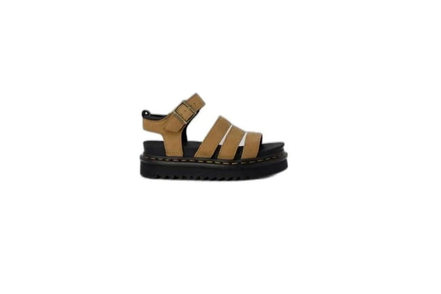 Tan leather sandal with multiple straps and thick black sole for a versatile wardrobe.