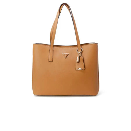 Tan leather tote bag with handles and charm from Guess Women Bag collection