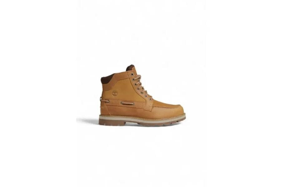 Tan leather work boot with lace-up design and chunky sole for men’s capsule wardrobe.