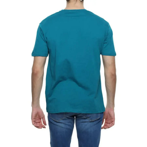 Teal short-sleeved Gianni Lupo Men T-Shirt worn by a person