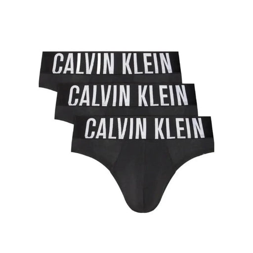 Three black Calvin Klein Men Underwear briefs with white elastic waistbands