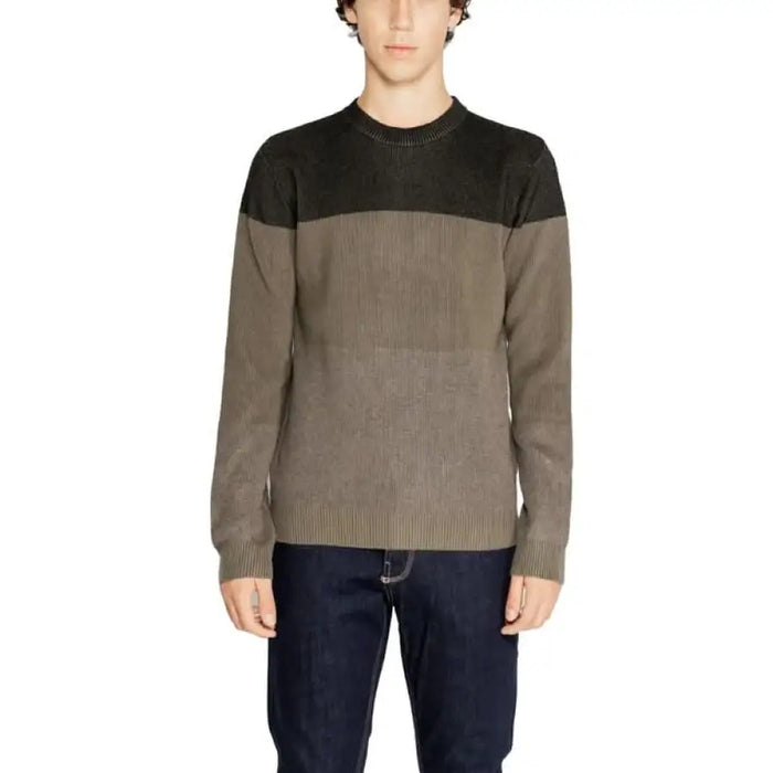 Two-tone crew neck sweater featuring black upper and taupe lower panels by Hamaki-ho