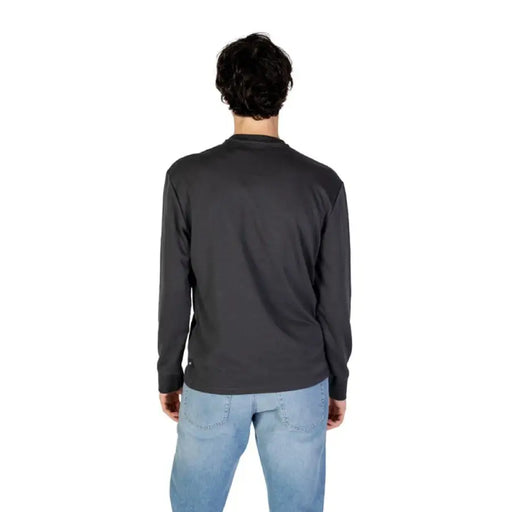 Back view of individual wearing Gas Men Black Long Round Neck Sweatshirt and jeans