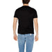 Rear view of a person in a black Ea7 Men T-Shirt and blue jeans