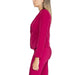 Side view of a model in a fuchsia dress paired with Rinascimento Women Blazer