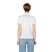 Back view of a person in a Blauer Women T-Shirt with light blue jeans