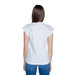 Back view of a person in a Guess Women T-Shirt with blue jeans