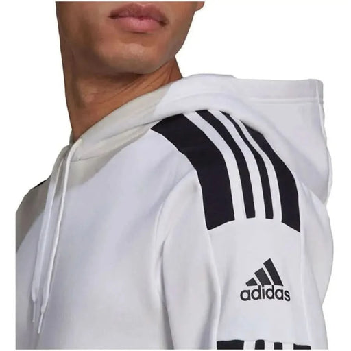 White Adidas hoodie featuring black striped detailing on the shoulder for men