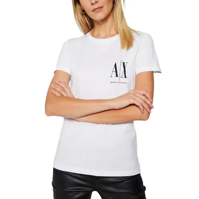 Woman in White Armani Exchange Logo T-Shirt with Crossed Arms - Armani Exchange