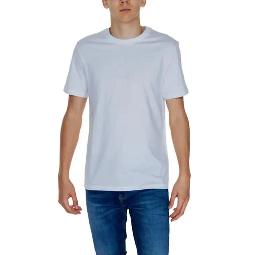 Guess Men T-Shirt White crew neck worn by person in blue jeans