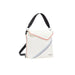 White handbag with diagonal colored stripes and a black strap by Desigual