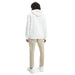 White hooded sweatshirt modeled by a person with dark hair from Calvin Klein Jeans