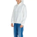 Calvin Klein Men’s white hooded sweatshirt with blue jeans from Calvin Klein Jeans collection