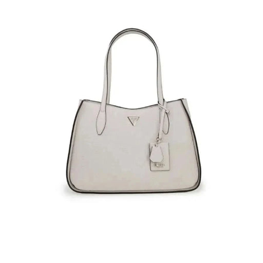 White leather handbag by Guess featuring a triangular logo and a hanging tag