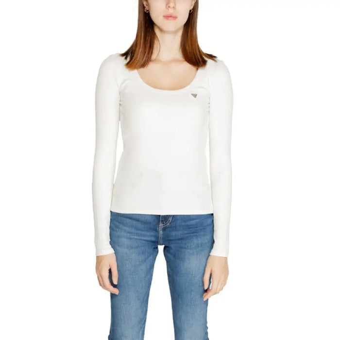 White long-sleeved scoop neck top paired with blue jeans from Guess Active Women T-Shirt