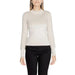 White long-sleeved textured sweater modelled by a person from Guess Women Knitwear