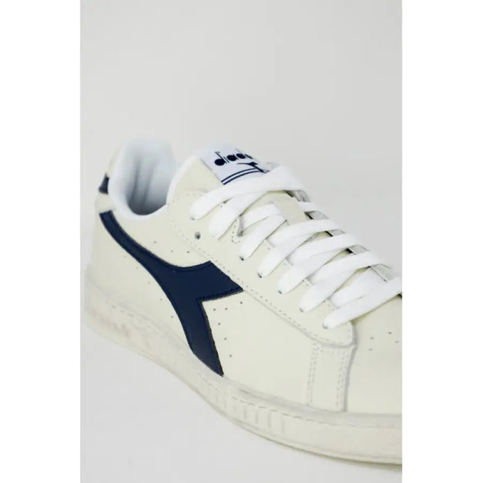 White and navy blue Diadora Men Sneakers featuring laces and a distinctive side logo