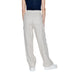 White loose-fitting trousers worn by a person from Street One Women Trousers collection