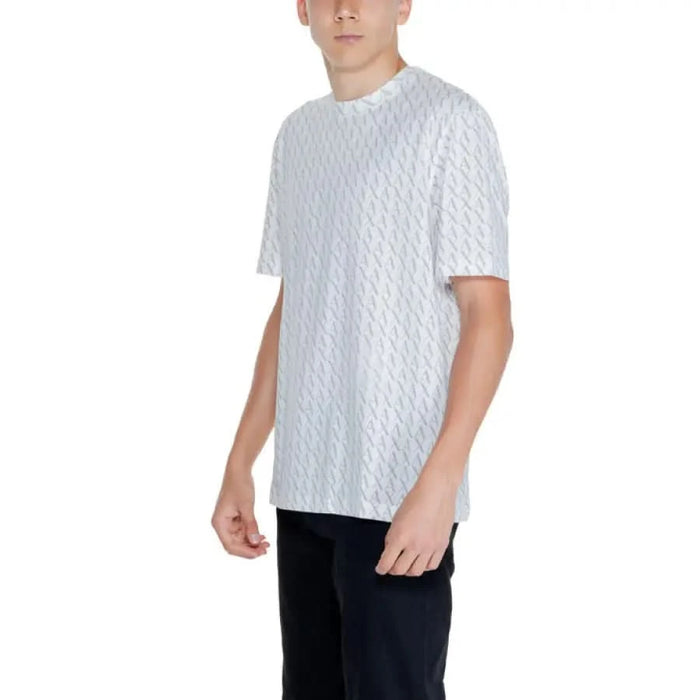 Young man wearing Armani Exchange Women’s T-Shirt - White patterned short-sleeve