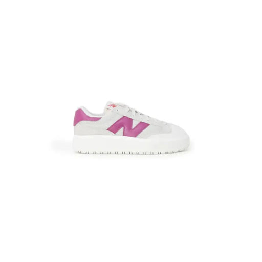 White and pink New Balance Women Sneakers with a thick sole