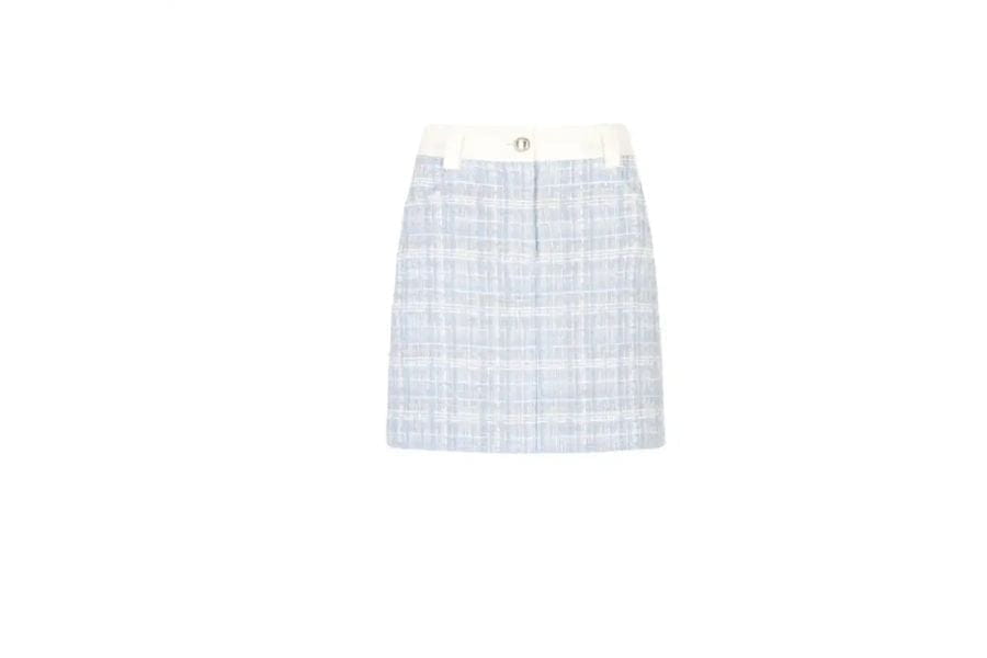 White plaid mini skirt with subtle pattern, perfect for holiday outfit in capsule wardrobe.