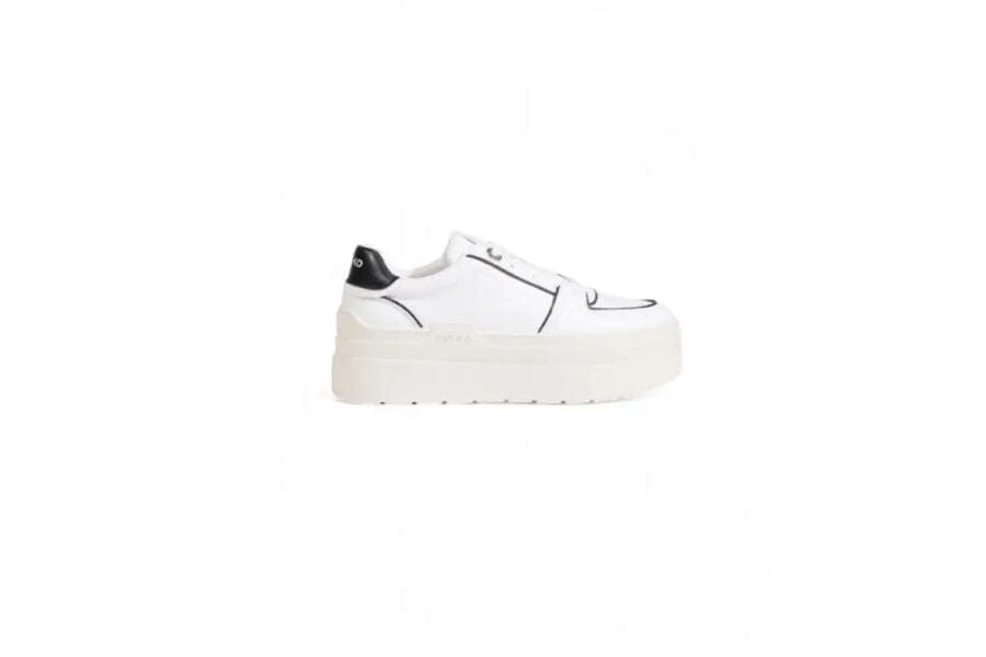 White platform sneaker with black heel accent perfect for summer outfit ideas to shop.