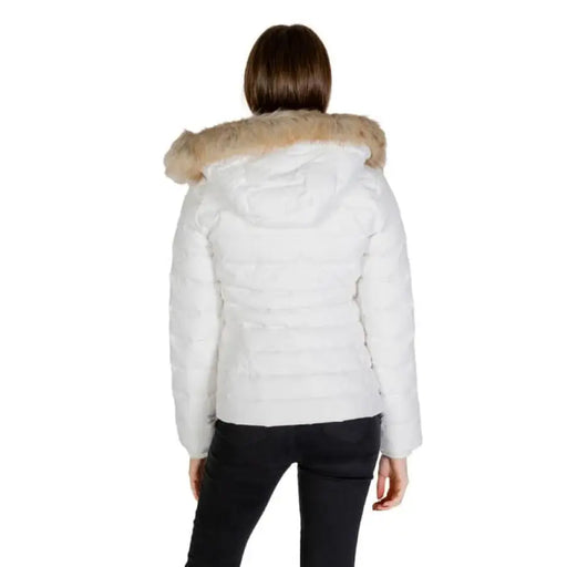 White puffer jacket with fur-trimmed hood displayed from behind by Tommy Hilfiger Jeans