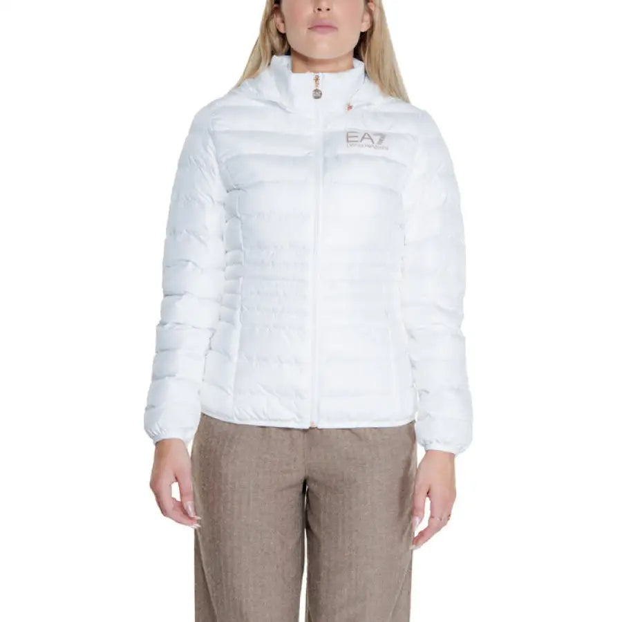 White puffy EA7 jacket worn with tan pants – featured in EA7 Women Jacket catalog