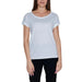 Woman wearing Vila Clothes short-sleeved white t-shirt