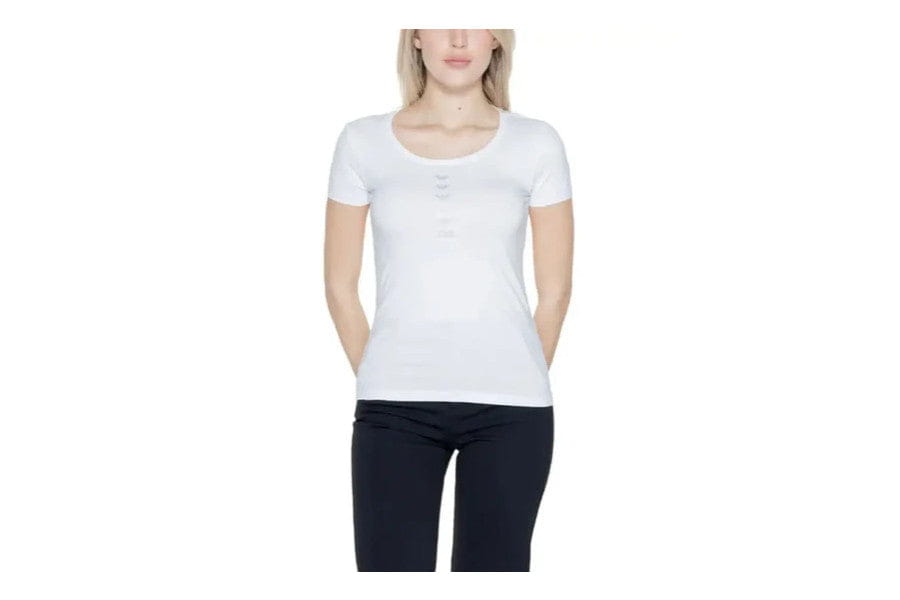 White short-sleeved t-shirt worn in stylish minimalist outfits for everyday wear.