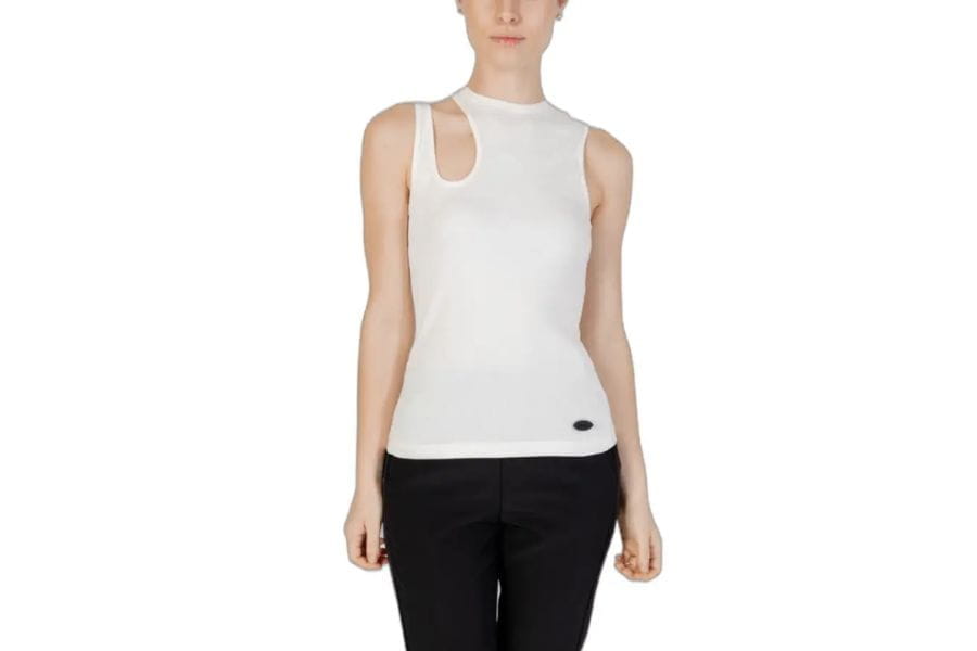 Elegant white sleeveless top features asymmetrical cutout, perfect for summer outfit ideas.