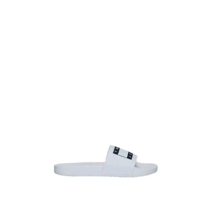 White slide sandal featuring black logo strap from Tommy Hilfiger Jeans Men Slippers