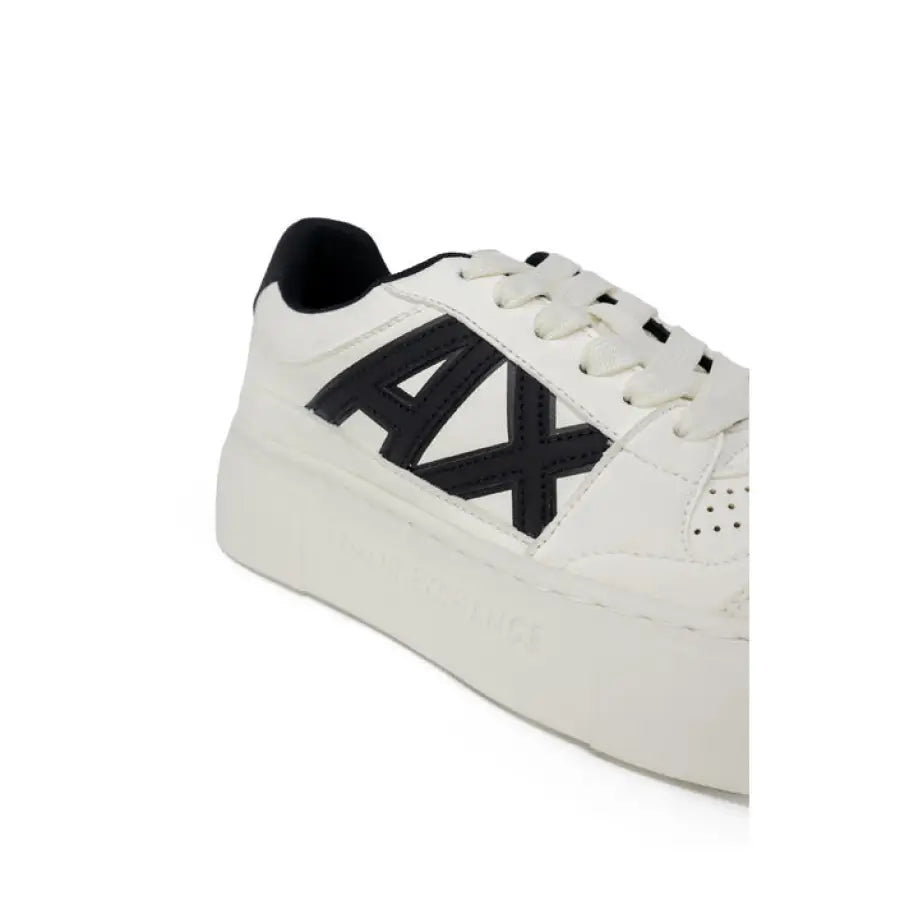 
                      
                        Armani Exchange Women Sneakers - White sneaker with black ‘AX’ logo on the side
                      
                    