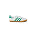 White Adidas men’s sneakers with green stripes and gum sole for stylish comfort