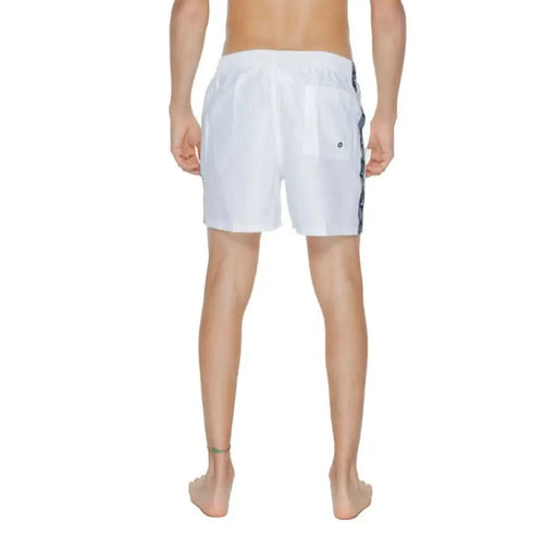 White swim shorts with dark side stripe from Nike Swim Men’s Swimwear collection