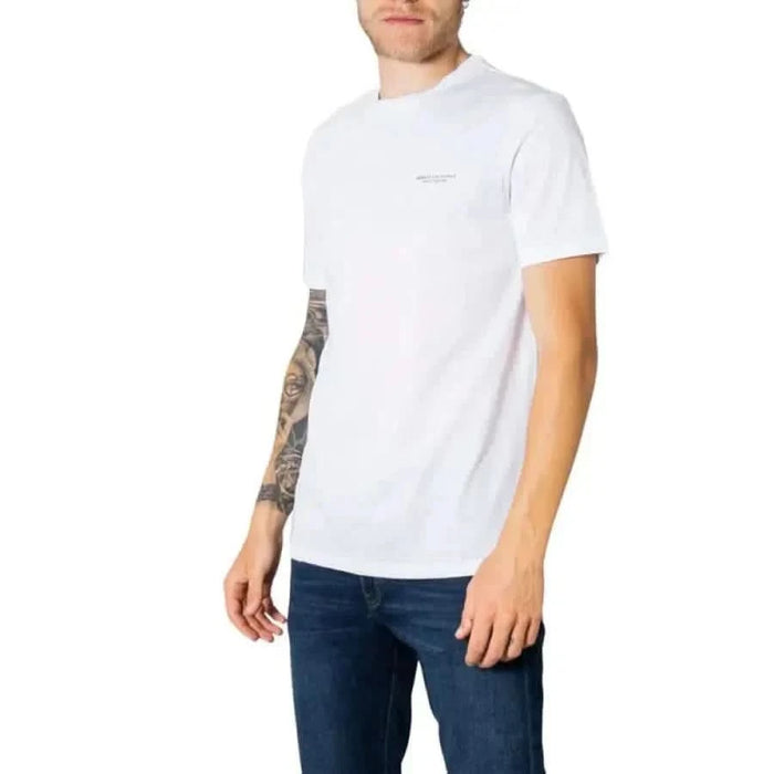 White short-sleeve Armani Exchange Men T-Shirt worn by tattooed person