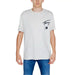 White Tommy Hilfiger Jeans Men T-Shirt with ’Tommy’ logo and flag emblem on chest