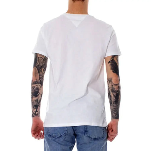 Tommy Hilfiger Men T-Shirt - White, modeled by a person with heavily tattooed arms