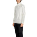 White turtleneck sweater on a person with dark curly hair from Gianni Lupo Men Knitwear